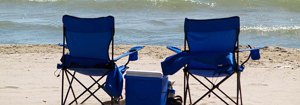 empty chairs on  a beach